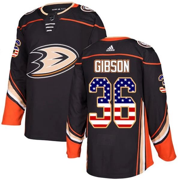 Herren Anaheim Ducks Eishockey Trikot John Gibson 36 Schwarz USA Flag Fashion Authentic